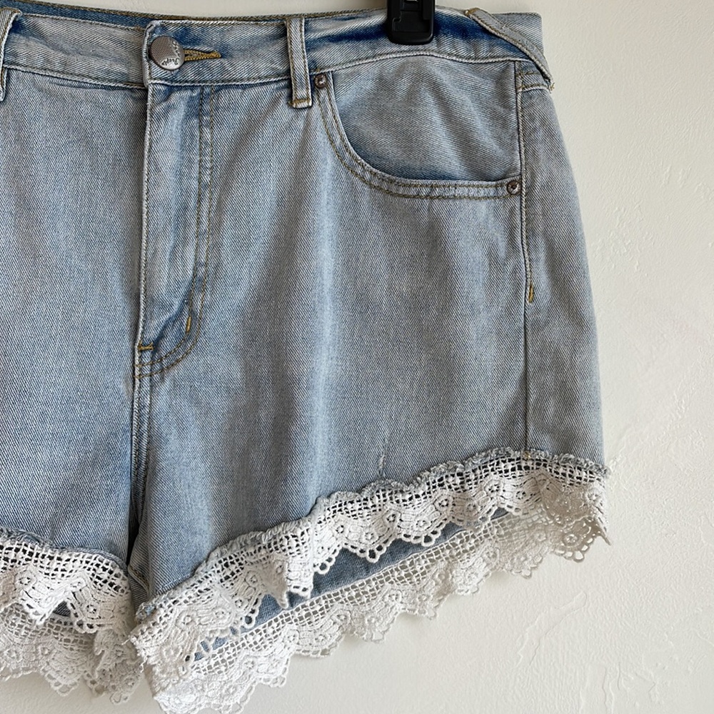 Free People lace lined denim shorts. 30